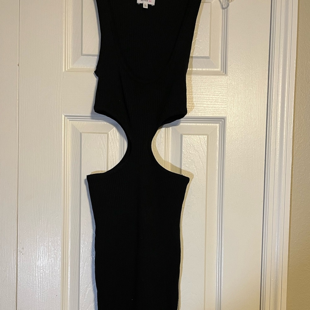 Long black dress with sides cute out